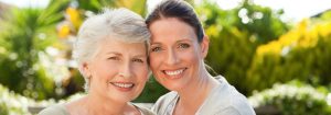 Portrait of mother and adult daughter