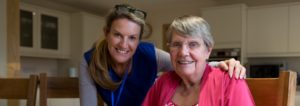 Volunteer delivering meal to a senior