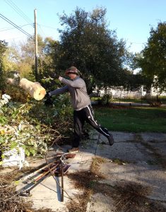 Cleaning up the yard of a local senior.