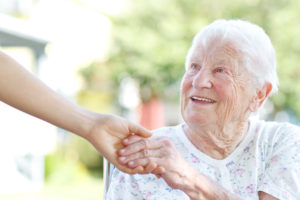 Older woman reaching for hand