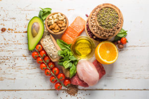 Collection of healthy food arranged in a heart shape