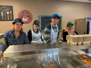 AAA 1-B staff volunteering at Farmington Hill's Costick Center