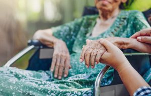 Elderly woman receiving care at home